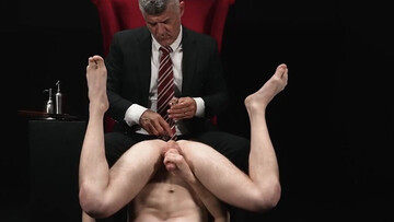 DILF wears a suit while spanking and banging a teen lad