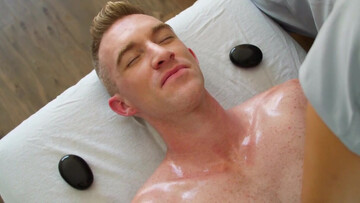 Lad with bleached hair gives a massage to a pervert