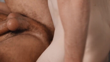 Inked dude with a tanned body catches a pale lad jerking off