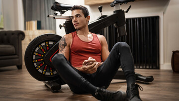 Sporty lads work the bike and each other's ass in a flaming duo