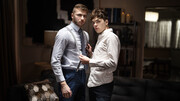Young lovers fuck on the leather couch in intriguing gay kinks