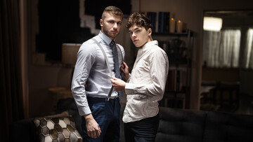 Young lovers fuck on the leather couch in intriguing gay kinks