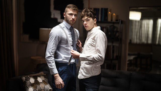 Young lovers fuck on the leather couch in intriguing gay kinks
