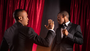 Black men in hot suits pose hot in sexy gay duo