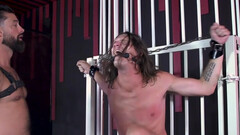 Chained male gets gagged and roughly spanked during rough sexual fetishes