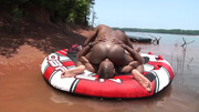 Energized black lovers get intimate by the lake in sunny perversions