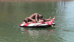 Energized black lovers get intimate by the lake in sunny perversions