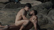 Appealing men make out in outdoor group sex by the beach