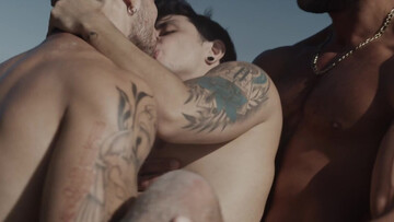 Appealing men make out in outdoor group sex by the beach