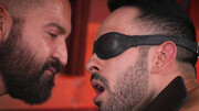 Blindfolded lad is deepthroating his hunky master