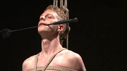 Branden Forrest  is tied up and shown in a BDSM video