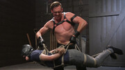 Master dominates his male slave while he worships his cock