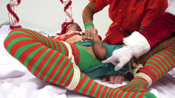 Appealing men play rough Christmas games in bondage perversions