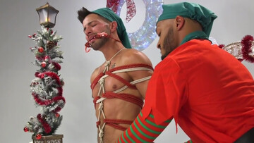 Appealing men play rough Christmas games in bondage perversions