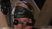 Gagged man lets the master throat the cock while he begs for more