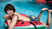 Sunbathing and trying big dicks in the ass is what makes this twink happy