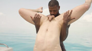 Horny guys make out on a boat in surreal interracial perversions