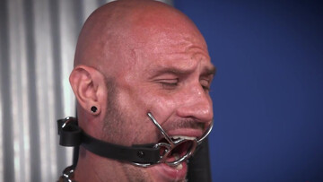 BDSM video with a dominant black man and a bald fella