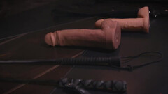 Gunnar Stone is putting a big sex toy inside Asher Day