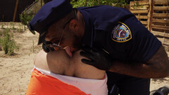 The inmate is getting banged by the tall black policeman