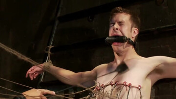 Pale man is tied and his cock gets juiced by the tall DILF