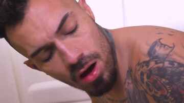 Latino is toyed with while toyed by by a tall hunk