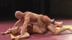 Muscular men use their huge dicks to wrestle in a kinky play