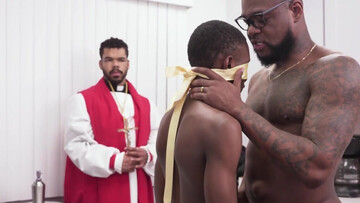 Two priests are watching the banging on the table