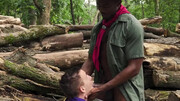 Black man with a big cock is fucking a scout twink