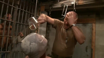 Tall man is in prison and he seems to be on a mission