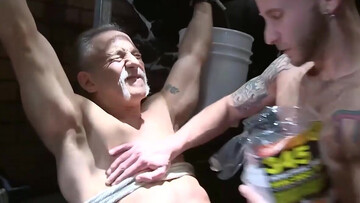 Bald man with tattoos is testing the limits of an older hunk