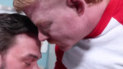 The bearded doctor takes good care of the tall ginger