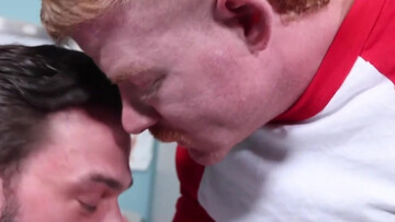 The bearded doctor takes good care of the tall ginger