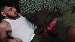 Army action with a bald stud and a petite brunette fella