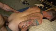 Man with a beard and lots of ink gets his ass stuffed