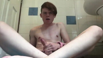 Solo twink jerks his dick wet as fuck in bathroom perversions