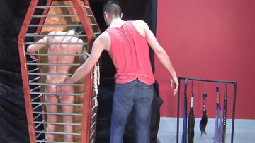 Flogging experience for a sub in that cage