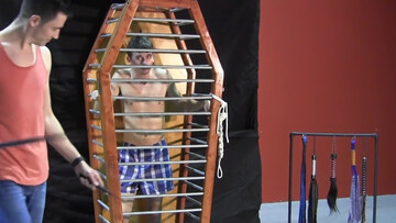 Caged boy is eager to experience his first maledom experience
