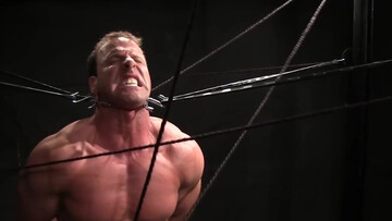 Muscular DILF provides great views in bondage fetish