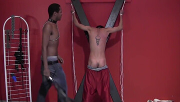 Black dominant partner whips horny twink during rough BDSM treat