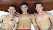 Naked boys share loud bareback sex in threesome scenes