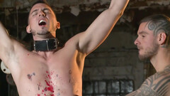 Waxed male slave endures harsh whipping and dirty gay perversions