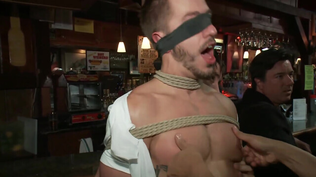 Submissive male gets intimate with a bunch of men at the pub
