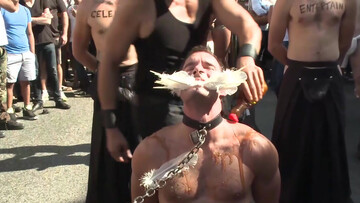 Submissive man lets his masters take advantage of him in public