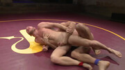 Naked men gag each other in the ring during a wrestling mix