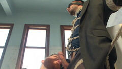 Bound baddie gets his cock jerked in a fun way