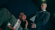 Men in suits share intimate blowjob in flawless manners