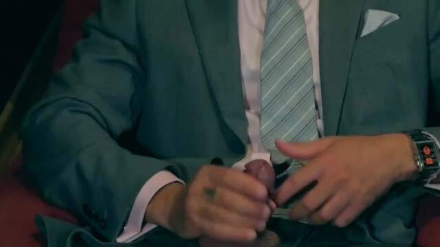 Men in suits share intimate blowjob in flawless manners