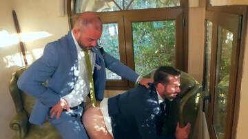 Horny men in suits fuck on the stairs and pose hot
